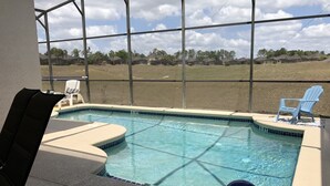 A swimming pool with a view of a residential area. - Calabay Parc 410 (Davenport)