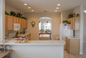 House, 5 Bedrooms | Private kitchen | Dishwasher, cookware/dishes/utensils - Highlands Reserve Golf & Country Club 533 (Davenport)