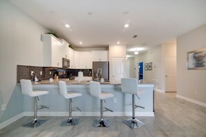 House, Multiple Beds | Private kitchen