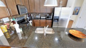 Townhome, 4 Bedrooms | Private kitchen | Dishwasher, cookware/dishes/utensils