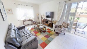Townhome, 4 Bedrooms | Living area | Flat-screen TV