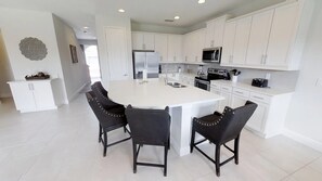 House, 5 Bedrooms | Private kitchen | Dishwasher, cookware/dishes/utensils - Encore Resort at Reunion 7711 (Kissimmee)