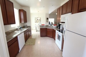 House, 4 Bedrooms | Private kitchen | Microwave, oven, stovetop, dishwasher