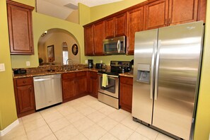 Villa, 3 Bedrooms | Private kitchen | Dishwasher, coffee/tea maker, cookware/dishes/utensils - Indian Creek 8060 (Kissimmee)