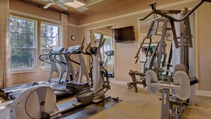 A gym with treadmills, ellipticals, and weight machines. - Lucaya Village 2905 - 101 (Kissimmee)