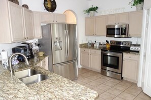 House, 5 Bedrooms | Private kitchen | Fridge, microwave, oven, dishwasher