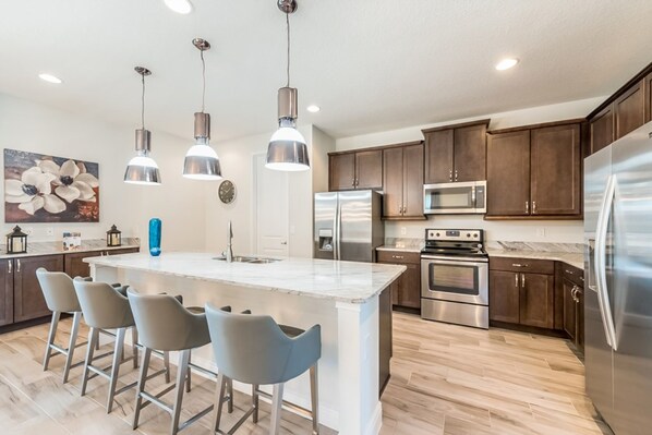 House, Multiple Beds | Private kitchen