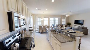 House, Multiple Beds | Private kitchen