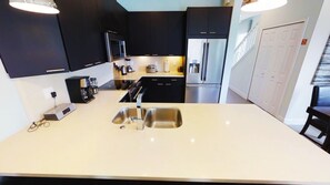 Townhome, 3 Bedrooms | Private kitchen | Fridge, dishwasher, cookware/dishes/utensils, freezer - The Retreat 1424 (Clermont)