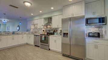 Condo, 2 Bedrooms | Private kitchen | Fridge, microwave, oven, stovetop
