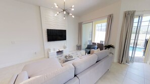 Stadtwohnung, 5 Schlafzimmer | Wohnbereich | Fernseher