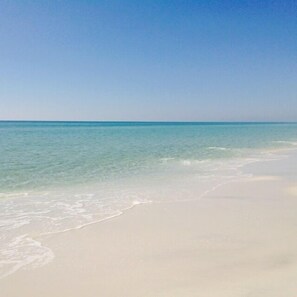 A beach with clear turquoise water and white sand. - 2 BR/2.5 BA condo/Redfish Village/Pool/Walk to beach/Beach chairs/umbrella (Santa Rosa Beach)