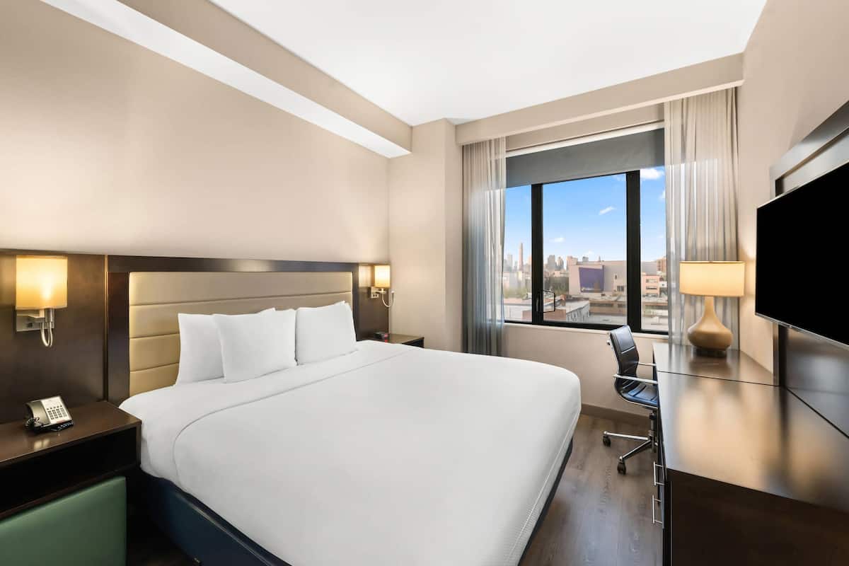 In-room safe, desk, laptop workspace, blackout curtains