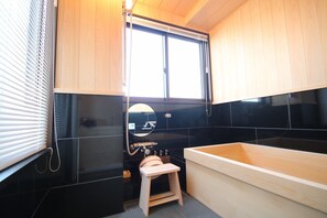 Separate tub and shower, deep soaking tub, free toiletries, hair dryer