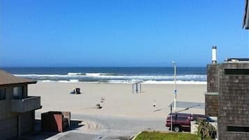 On the beach, sun loungers, beach towels