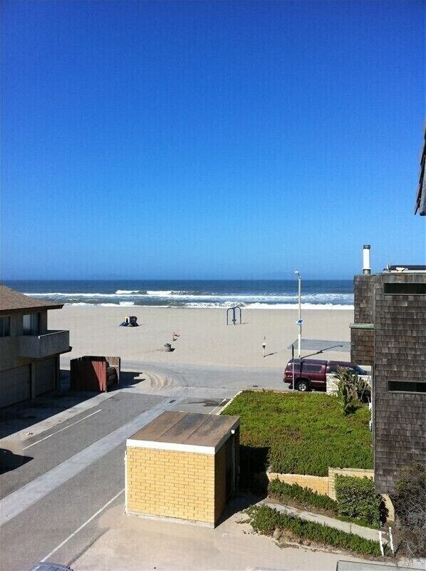 On the beach, sun loungers, beach towels