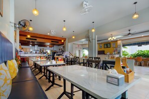 Breakfast, lunch, dinner served; local and international cuisine 