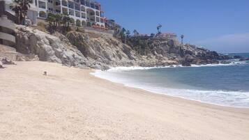 On the beach, sun loungers, beach towels