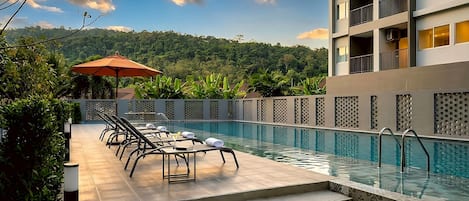 Outdoor pool, sun loungers