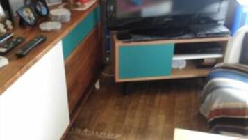 Double Room, Garden View | Living area | Flat-screen TV, DVD player