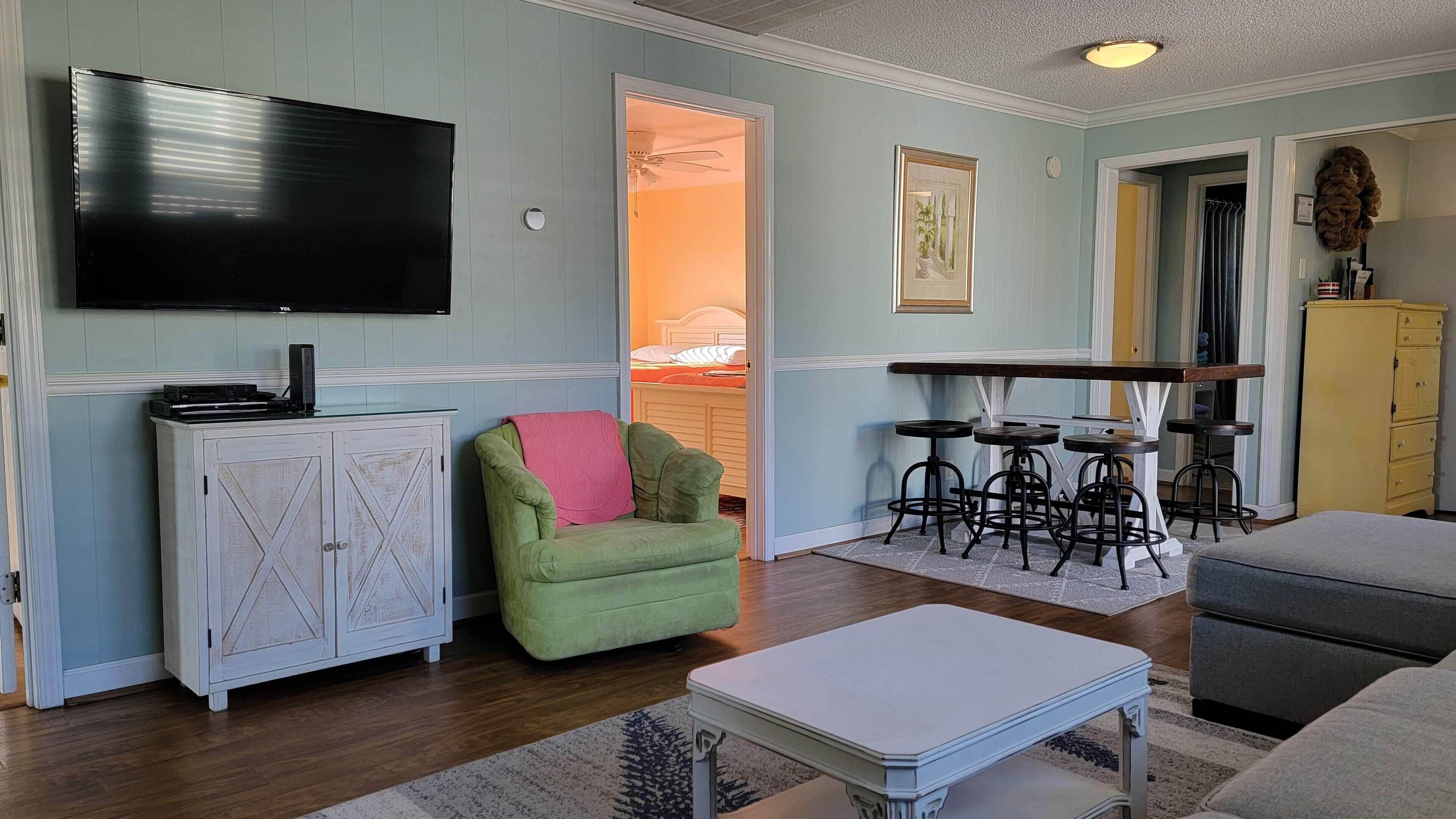 Large yard with water access & floating dock/kayak launch. One block from beach