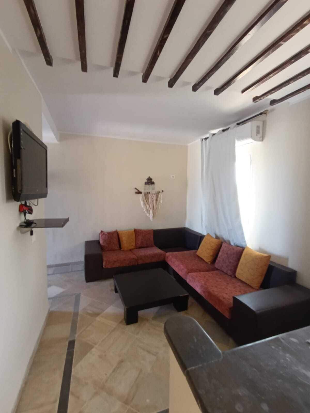 Appartamento, 2 camere da letto | Area soggiorno | TV a schermo piatto