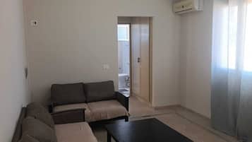Apartment, 2 Bedrooms | Living area | Flat-screen TV