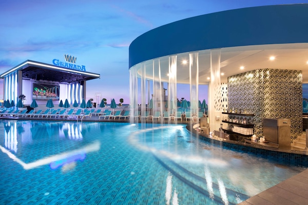 Indoor pool, seasonal outdoor pool, pool umbrellas, sun loungers