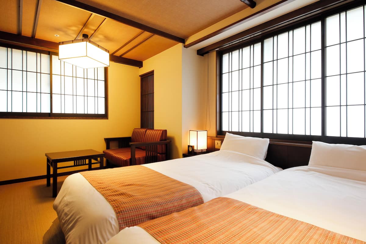 Twin Room with Semi-Open-Air Bath, Non Smoking | In-room safe, iron/ironing board, free WiFi, bed sheets