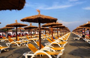 Sun loungers, beach umbrellas, beach towels, beach massages