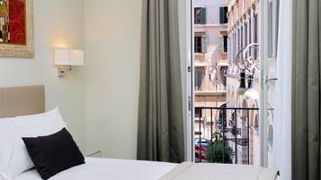Premium bedding, down comforters, memory foam beds, minibar