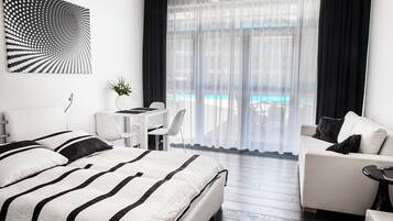 1 chambre, fer et planche à repasser, lits bébé (en supplément)