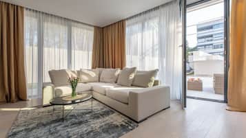 Deluxe Apartment, 2 Bedrooms (I) | Living area | Flat-screen TV