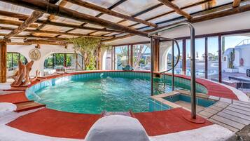 Indoor pool, seasonal outdoor pool, pool umbrellas, sun loungers