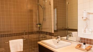 Bathtub, free toiletries, hair dryer, bathrobes