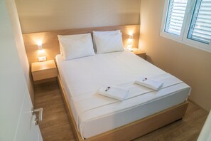 2 chambres, literie de qualité, coffre-fort, décor unique
