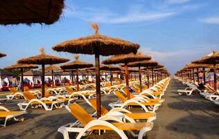 Private beach, white sand, sun loungers, beach umbrellas