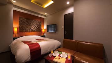 Blackout drapes, soundproofing, iron/ironing board, free WiFi