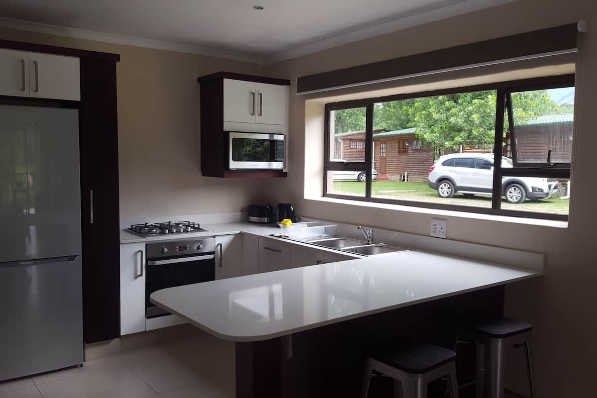 luxury studio (lakeside) | private kitchen | full-sized fridge, microwave, oven, stovetop