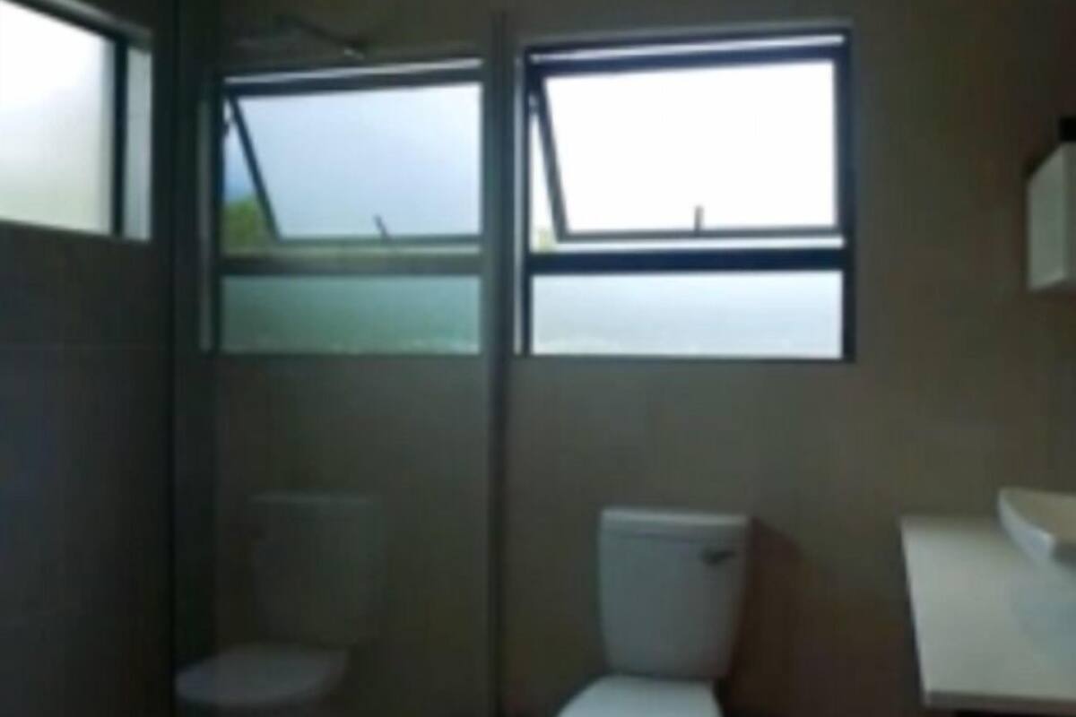 luxury studio (lakeside) | bathroom | shower, rainfall showerhead, free toiletries, towels