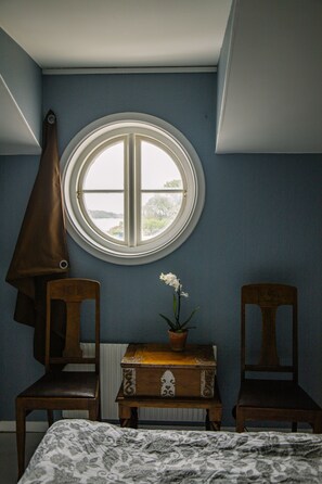 Habitación doble, baño compartido | Cortinas opacas, tabla de planchar con plancha, wifi gratis