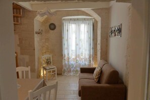 Suite Luxe, 2 chambres, baignoire à jets (Ulivo) | Coin séjour | Télévision LCD