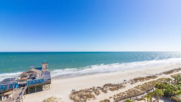 On the beach, white sand, beach towels