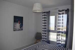 2 slaapkamers, een strijkplank/strijkijzer, gratis wifi, beddengoed