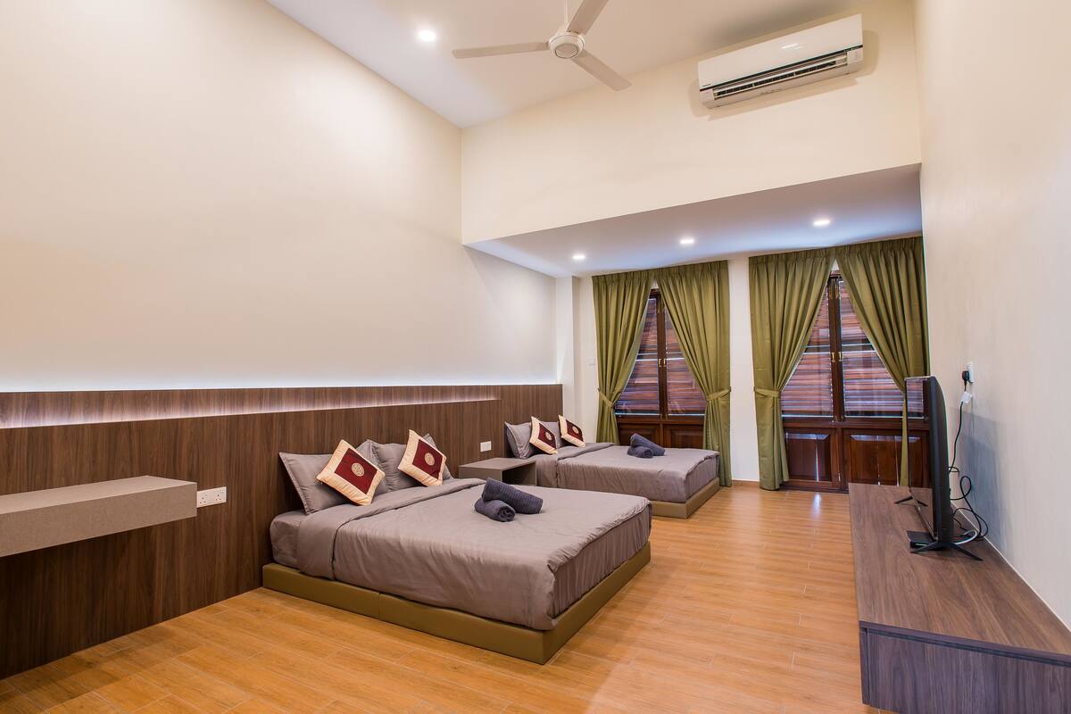 Deluxe Quadruple Room, 2 Queen Beds, Non Smoking | Premium bedding, down comforters, blackout drapes, iron/ironing board