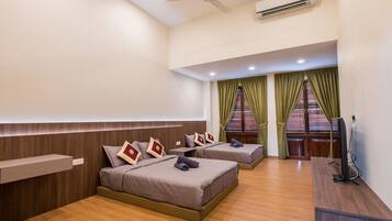 Deluxe Quadruple Room, 2 Queen Beds, Non Smoking | Premium bedding, down comforters, blackout drapes, iron/ironing board