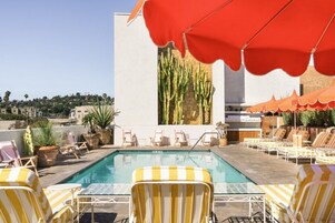 Outdoor pool, pool umbrellas, sun loungers