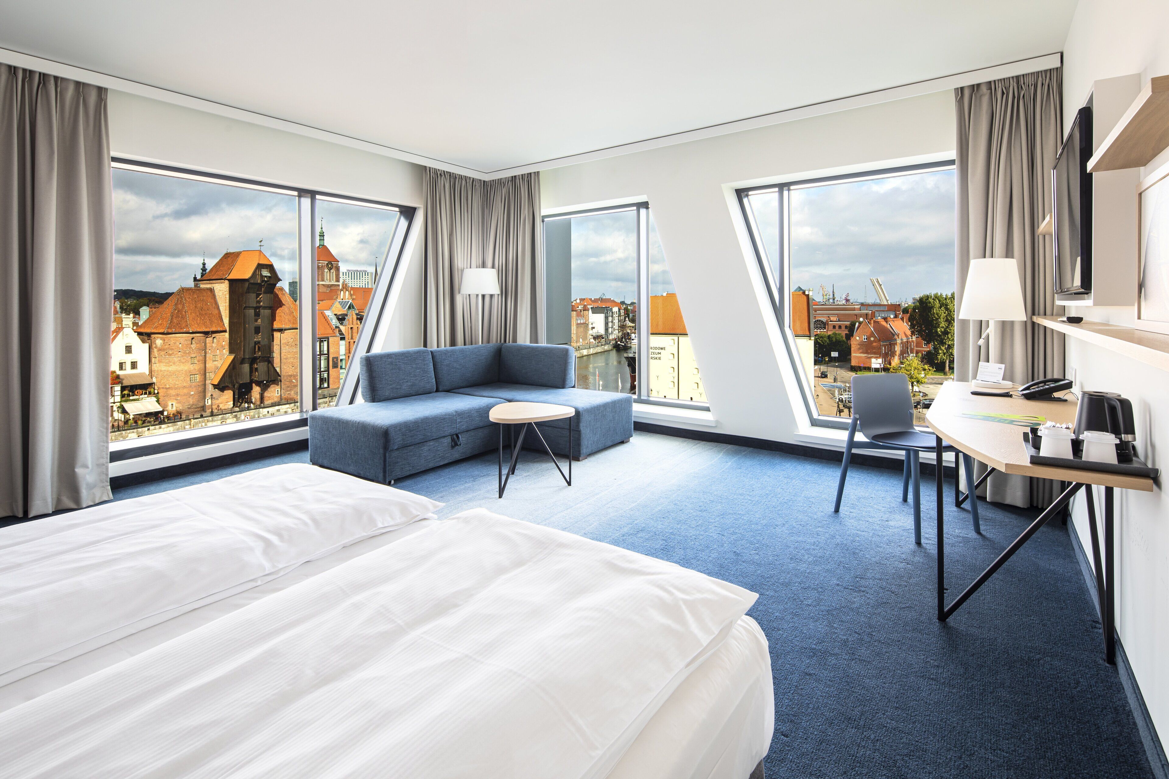 premium room, 1 king bed, river view | 1 bedroom, minibar, in-room safe, individually decorated