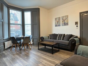 Appartement | Coin séjour | TV connectée