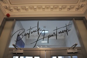 A window with the text "Bertinck Apartments" written on it. - Bentinck Apartments (Newcastle-upon-Tyne)